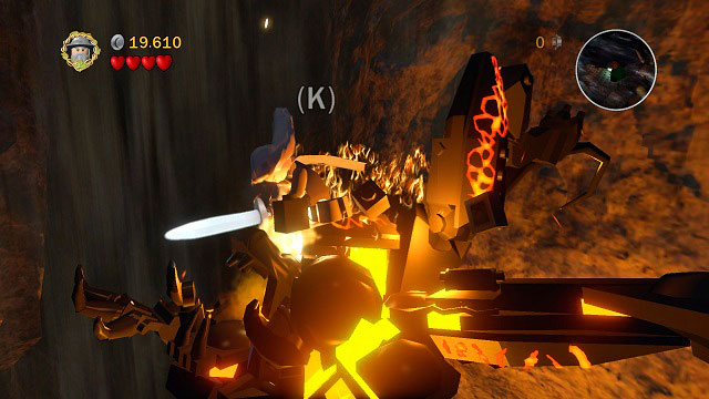 After a couple hits you will have to press (K) to lead out a more powerful attack, after which you will be thrown into the air - The Mines of Moria - Walkthrough – Act I - LEGO The Lord of the Rings - Game Guide and Walkthrough