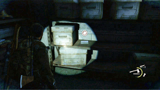 It is to the right of Ellie’s backpack - Lakeside Resort - Artifacts and pendants - The Last of Us - Game Guide and Walkthrough