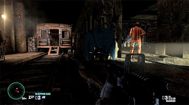 After you pass by the first car, turn towards the left part of the tunnel and walk around the second car on the left - Disarm the second bomb - Mission 7 – Transit Yards - Tom Clancys Splinter Cell: Blacklist - Game Guide and Walkthrough