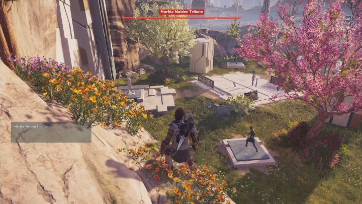 The tribute can be found at the base of one of the larger mountains - Minoss Faith | Marble Maiden Tribute - Marble Maiden Tribute - Assassins Creed Odyssey Guide