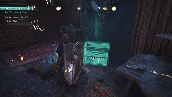 The first clue is a small table with scrolls scattered about - Assassins Creed Valhalla: The Welcoming Party - guide - Jorvik - Assassins Creed Valhalla Guide