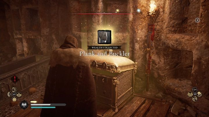 Inside you will immediately notice a golden box that contains a heavy shield - Assassins Creed Valhalla: Gear - East Anglia secrets, locations - East Anglia - Assassins Creed Valhalla Guide