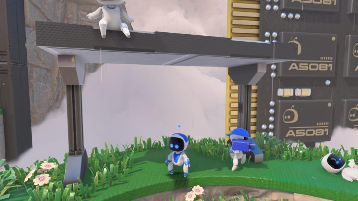 When you go through the stage of the game where Astro pulls out an umbrella, hide under the canopy next to the rock - Astros Playroom: Trophies - Appendix - Astros Playroom Guide