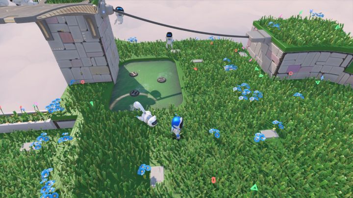 A squirrel-like bot runs on the grass - Astros Playroom: Gusty Gateway - walkthrough - Meadow of Remembrance - Astros Playroom Guide