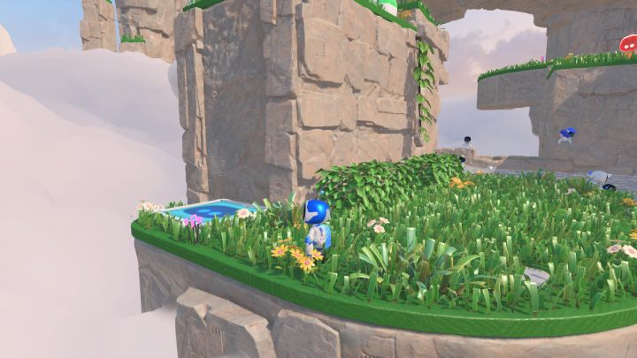 Get back on the grass and find the blue trampoline that will take you to the next level - Astros Playroom: Gusty Gateway - walkthrough - Meadow of Remembrance - Astros Playroom Guide