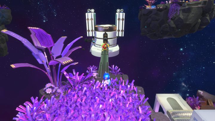 Collect all the coins from the purple grass, then cross the metal bridge - Astros Playroom: Deep Dataspace - walkthrough - SSD Highway - Astros Playroom Guide