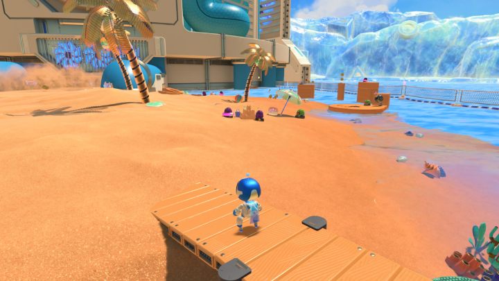 Go back to the island and defeat several enemies near the sand castle on the right side of the island - Astros Playroom: Bot Beach - walkthrough - Cooling sources - Astros Playroom Guide
