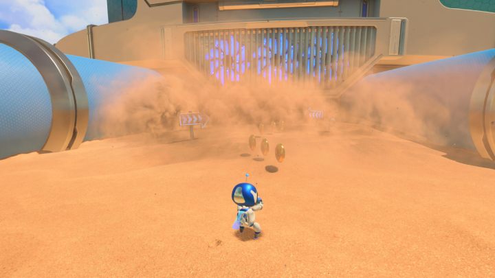Enter the sandstorm between the blue pipes - Astros Playroom: Bot Beach - walkthrough - Cooling sources - Astros Playroom Guide