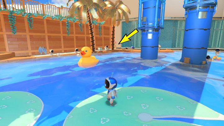 Collect the coins from the palm leaves and then swim to the right end of the pool - Astros Playroom: Bot Beach - walkthrough - Cooling sources - Astros Playroom Guide