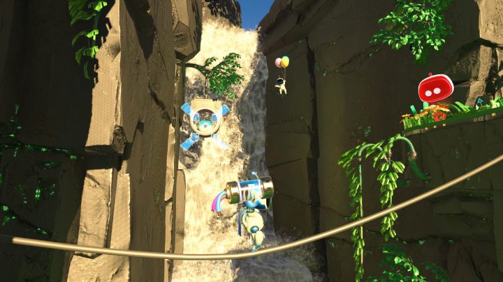Bevor Sie auf die andere Seite gehen, schießen Sie den Münzbehälter und den am Wasserfall schwebenden Bot ab – Astros Playroom: Renderforest – Komplettlösung – GPU Jungle – Astros Playroom Guide