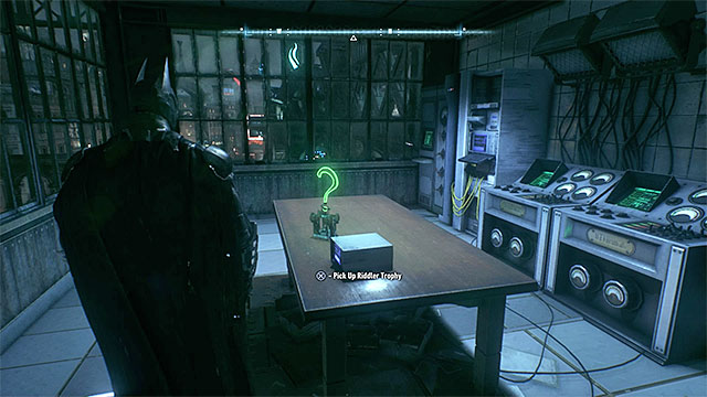 The trophy is lying on the table - Riddler trophies on Bleake Island (19-36) | Collectibles - Bleake Island - Collectibles - Bleake Island - Batman: Arkham Knight Game Guide & Walkthrough