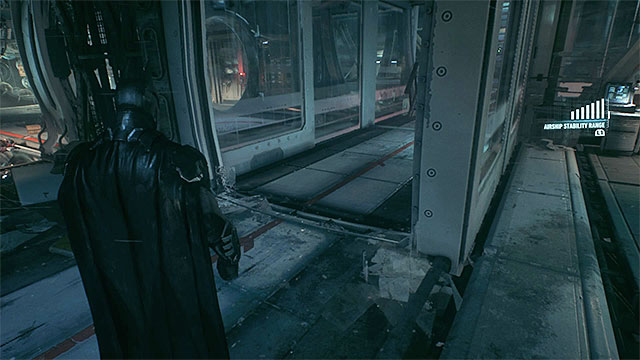 The box will destroy one of the glass walls once you make the airship swing hard enough - Find Scarecrow onboard the second airship | Main story - Main story - Batman: Arkham Knight Game Guide & Walkthrough