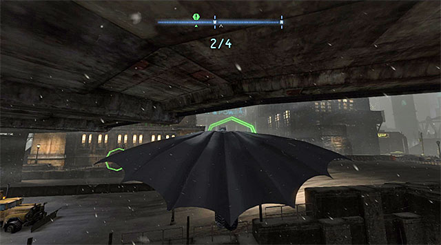 Glide towards the ring located on the left but, correct the flight path in the mid-flight, accordingly, to steer towards the bridge on the right - Dark Knight System - Challenges - Batman: Arkham Origins - Game Guide and Walkthrough