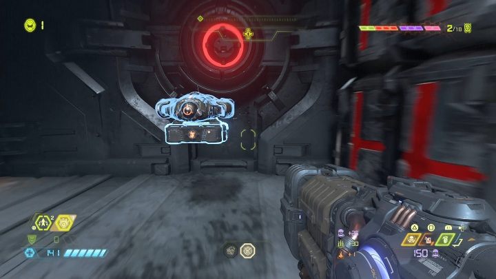 You will find the weapon upgrade at the end of the metal road, next to the closed door - Doom Eternal: Cultist Base secrets maps and location - Collectibles and secrets - Doom Eternal Guide