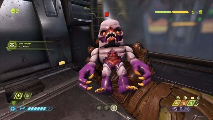 To open the passage to this doll, you need to shoot at the green button located near the ceiling - Doom Eternal: Doom Hunter Base secrets maps and location - Collectibles and secrets - Doom Eternal Guide