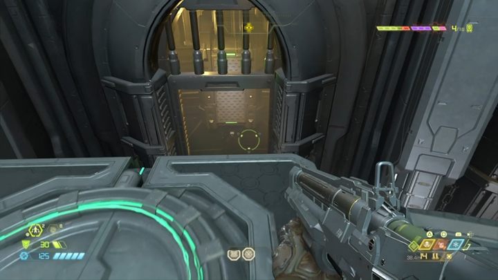 In the next chamber, you have to turn so that you can jump on the wall below, and then swing on the bars to reach the switch - Doom Eternal: Cultist Base walkthrough - Levels walkthrough - Doom Eternal Guide