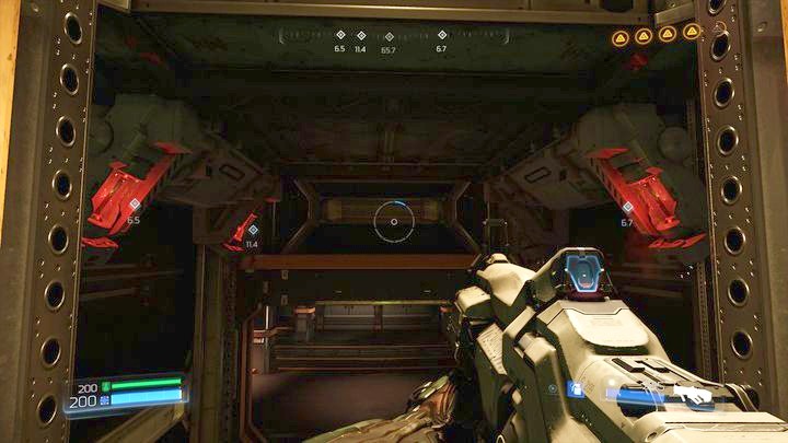 When you will reach the shaft again, jump on the platform above and then turn around and shoot the four brakes which block the elevator - Argent Energy Tower | Walkthrough - Walkthrough - Doom Game Guide & Walkthrough
