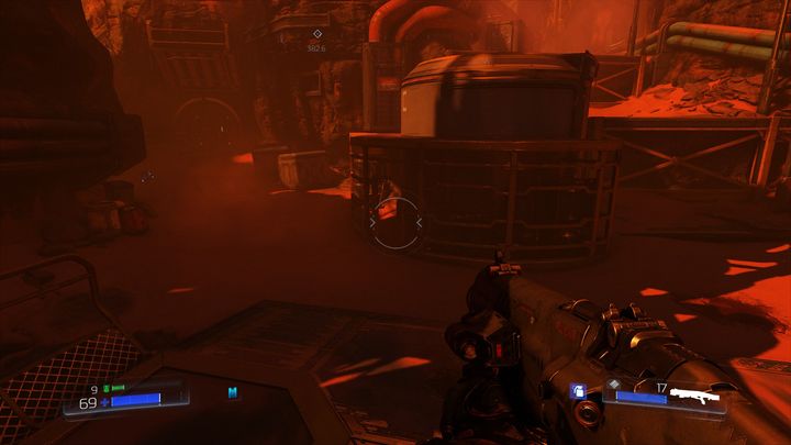 If you turn around while standing on the chests, you should notice a passage between the bars on the left side - The UAC | Walkthrough - Walkthrough - Doom Game Guide & Walkthrough