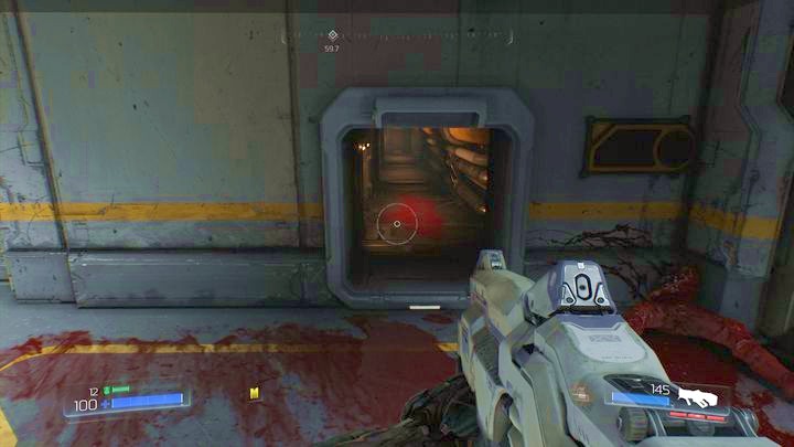 After riding one floor up walk next to the drone and enter the room on the right - Resource Operations | Secrets - Secrets - Doom Game Guide & Walkthrough