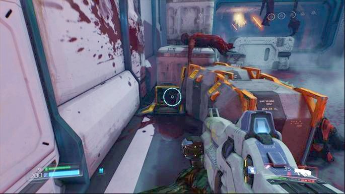 But before you jump down, first use the lever hidden behind the chests on the right - VEGA Central Processing | Secrets - Secrets - Doom Game Guide & Walkthrough