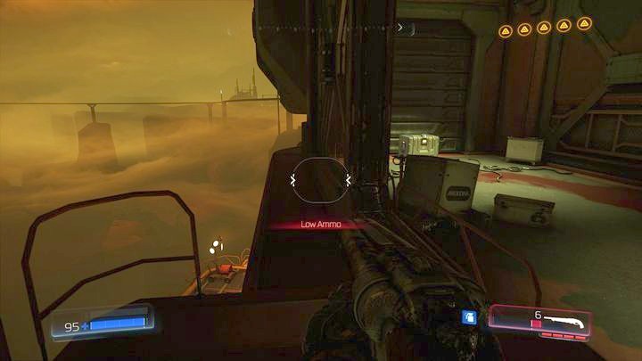 Before you jump below, first go carefully through the edge to the other side (next to the ammunition box) - Argent Facility | Walkthrough - Walkthrough - Doom Game Guide & Walkthrough