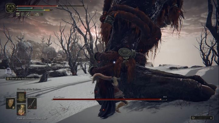 For the first part of the fight, stay close to the giant's left leg and attack it as often as possible - Elden Ring: Fire Giant - boss, how to beat? - Giant Mountain Peaks - Elden Ring Guide