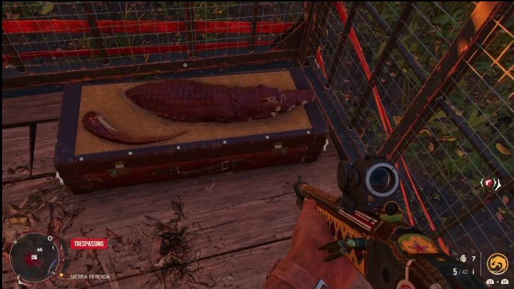 Die Truhe befindet sich in einem Käfig, der mit Riemen gesichert wurde – Far Cry 6: Beste Waffen – Liste – Grundlagen – Far Cry 6 Guide