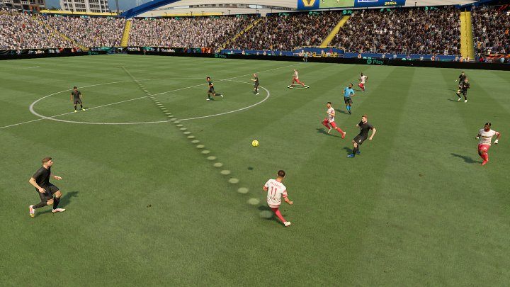 A lob through pass allows you to play the ball while skipping one, or often even two defensive formations of your opponent, creating a dangerous scoring opportunity - FIFA 22: Passes - Basics - FIFA 22 Guide