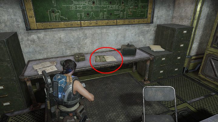 Pick up the collectible lying on the desk - UIR space mission brief - Act 3 Chapter 2 - Rocket Plan | Gears 5 Walkthrough - Act III - Gears 5 Guide