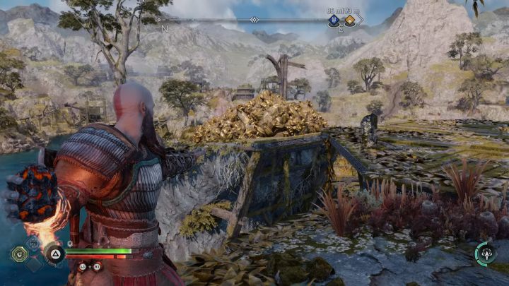 Pick up a bomb and destroy debris nearby - God of War Ragnarok: How to free Lyngbakrs fins and tail? - Exploration - God of War Ragnarok Guide