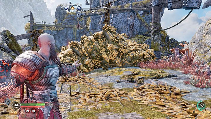 Take the bomb to the yellow blockade and throw it - God of War Ragnarok: How to destroy yellow crystal blockades? - Exploration - God of War Ragnarok Guide