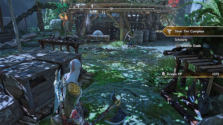 The scroll lies on the ground in the camp, near the crane that can be rotated - God of War Ragnarok: The Abandoned Village, Vanaheim - secrets, collectibles - Vanaheim - God of War Ragnarok Guide