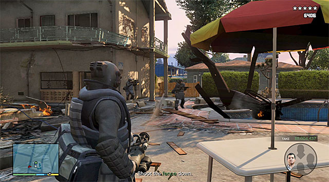 Soon after the fights start, there will appear a police chopper above the bank and, it would be good if you shot it down quickly - 54: The Paleto Score - Main missions - Grand Theft Auto V Game Guide