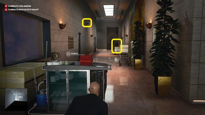 The corridor is guarded by one guard and a camera on the wall to the left - Hitman 3: Best Disguises, Dubai (Burj Al-Ghazali) - On Top of the World - Dubai - Hitman 3 Guide