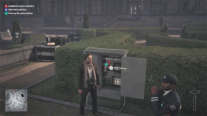 Once you got the cell, head to the fuse box located west of the fountain in the garden - Hitman 3: A Day to Remember - Dartmoor, Mission Stories, walkthrough - Death in the Family - Dartmoor - Hitman 3 Guide