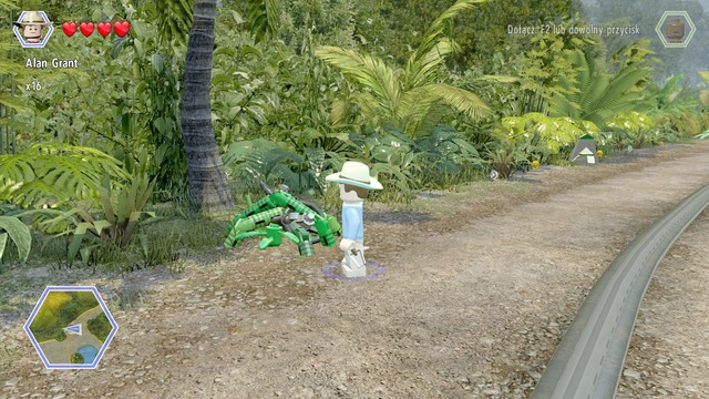 As Grant, walk to the plants blocking the bricks and cut them - Visitors Center | Jurassic Park - secrets in free roam - Jurassic Park - secrets in free roam - LEGO Jurassic World Game Guide & Walkthrough