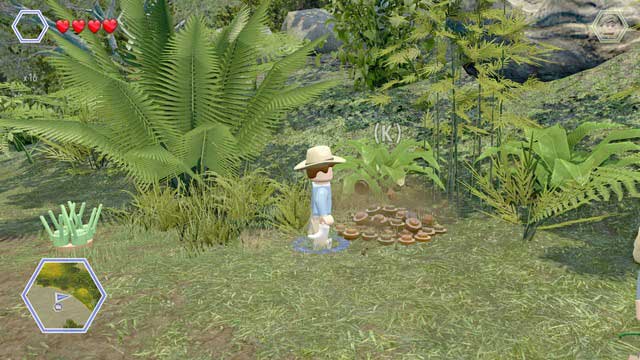 As Grant, walk to the pile of ground and dig up a blue brick from it - Brachiosaurus Plains | Jurassic Park - secrets in free roam - Jurassic Park - secrets in free roam - LEGO Jurassic World Game Guide & Walkthrough