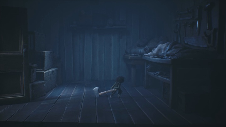 You need to drag the axe to the door blocking your access to Six - Little Nightmares 2: A Cottage in the Forest - walkthrough - Chapter 1 - Forest - Little Nightmares 2 Guide