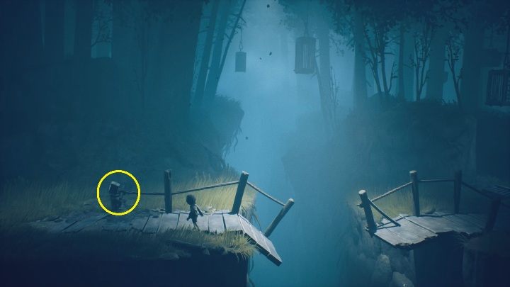 You must pull the string to lift a section of the bridge, which will allow Six to jump to the other side - Little Nightmares 2: Escaping the Hunter - walkthrough - Chapter 1 - Forest - Little Nightmares 2 Guide