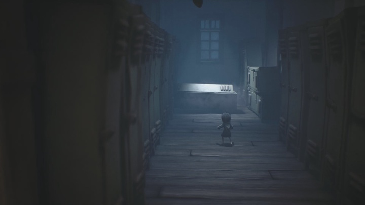 As you approach the cabinet it will fall right on your head - Little Nightmares 2: School - guide, walkthrough description - Chapter 2 - Orphanage - Little Nightmares 2 Guide