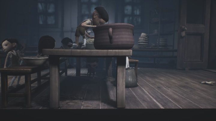 Sneak under the table to get past the fight going on upstairs - Little Nightmares 2: the Kitchen - guide, walkthrough description - Chapter 2 - Orphanage - Little Nightmares 2 Guide