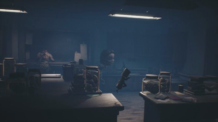 She moves along the shelves, going through the bottom won't do you any good - Little Nightmares 2: the Kitchen - guide, walkthrough description - Chapter 2 - Orphanage - Little Nightmares 2 Guide