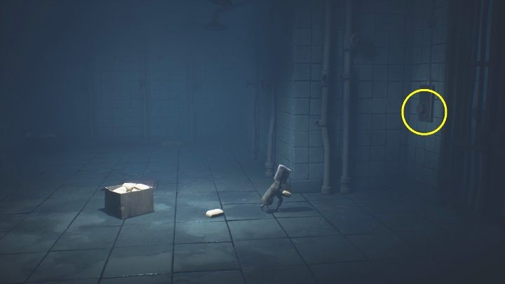 Throw the soap at the button, which will open the door and allow you to enter - Little Nightmares 2: Wheelchair puzzle - How to get out? - Riddles - Little Nightmares 2 Guide