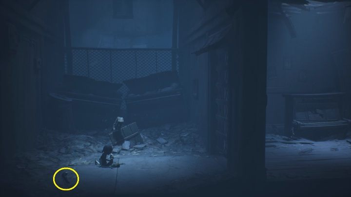 Outside, you will see a girl abusing a corpse with a wrench - Little Nightmares 2: Escape from School - guide, walkthrough - Chapter 2 - Orphanage - Little Nightmares 2 Guide