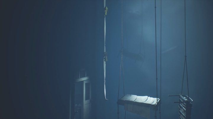 Your task is to jump to the rolled-up bedding, which will serve you as a rope for climbing - Little Nightmares 2: The First Floor - walkthrough - Chapter 3 - Hospital - Little Nightmares 2 Guide