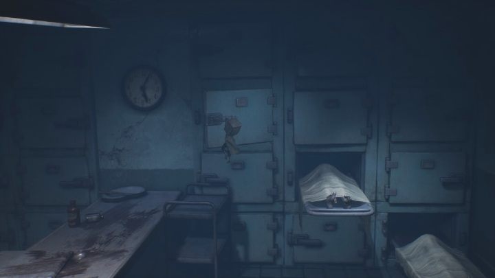 Jump on the corpse – you will be able to reach the doorknob, from which you will fall onto the wooden top - Little Nightmares 2: Escape - walkthrough - Chapter 3 - Hospital - Little Nightmares 2 Guide
