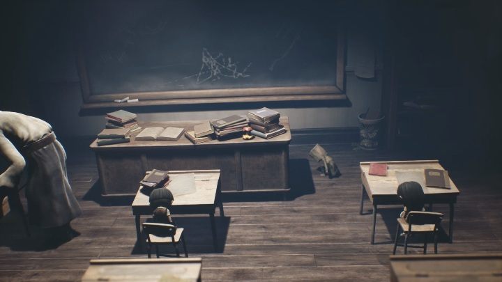 The perfect place to hide would be on a desk - Little Nightmares 2: School - Chapter 2 Orphanage walkthrough - Chapter 2 - Orphanage - Little Nightmares 2 Guide