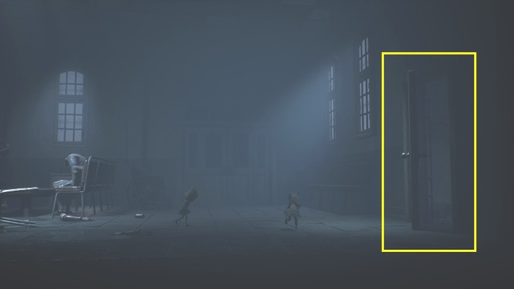 All you need to do to get out of the hospital is to reach the door, which turns out to be unlocked, allowing you to go through and continue onwards - Little Nightmares 2: Crossing the city - a guide, walkthrough - Chapter 4 - Getting to the Tower - Little Nightmares 2 Guide