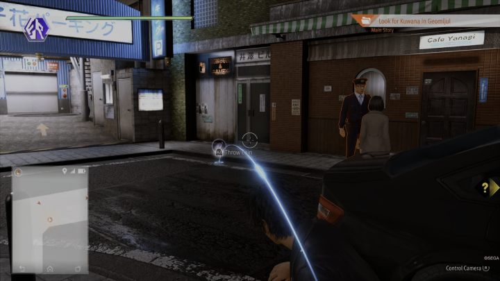 Follow the street to the next checkpoints, distracting the police officers - Lost Judgment: Chapter 10 Catch a Tiger - walkthrough - Main Storyline - Lost Judgment Guide