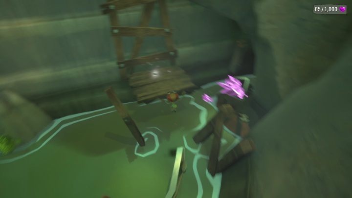 Before entering the abandoned cave, you need to jump down to one of the lower rocks, then onto a metal railing - Psychonauts 2: PSI Challenge Card, The Quarry - where to find? - The Quarry - Psychonauts 2 Guide
